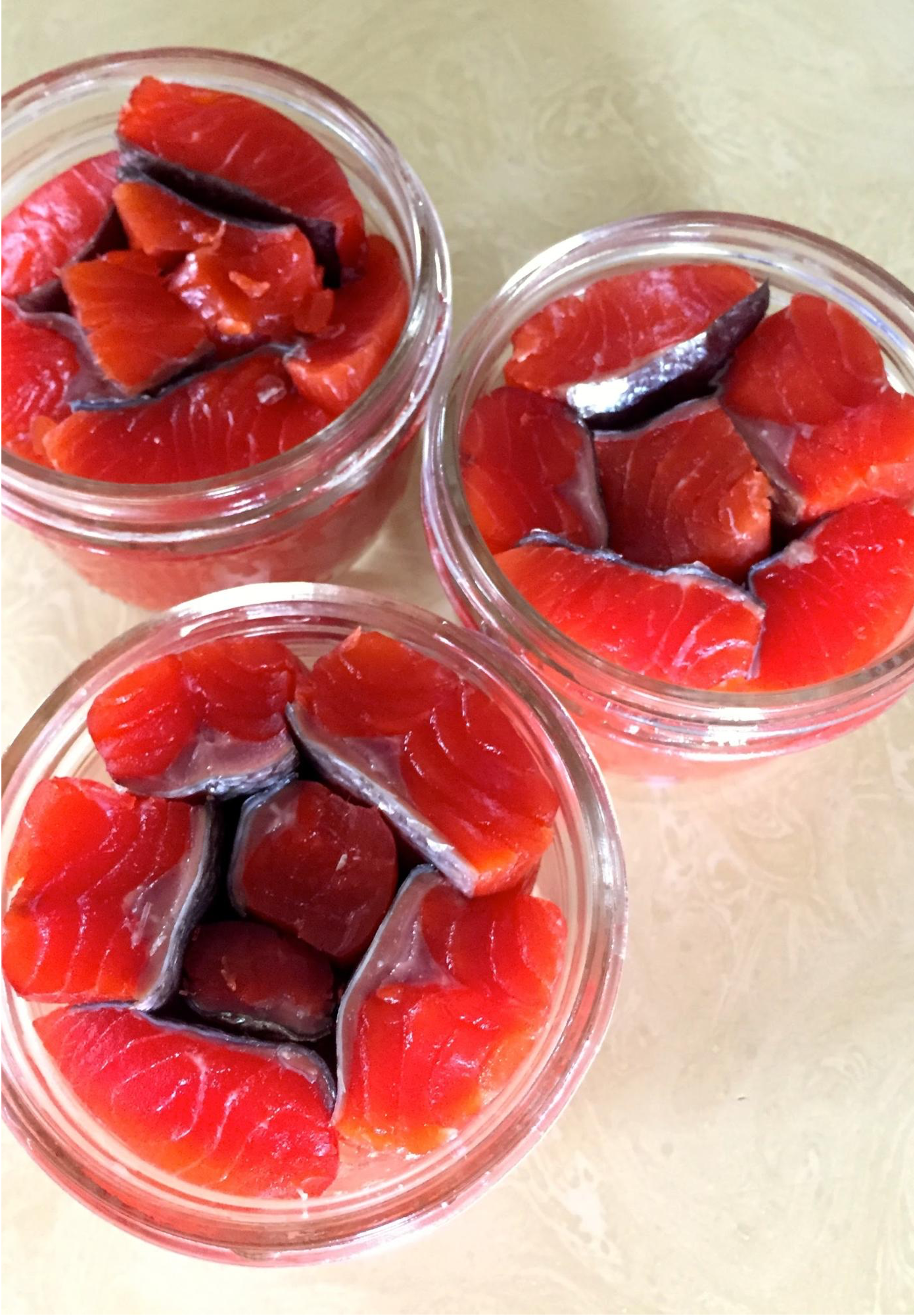 Three jars filled with salmon